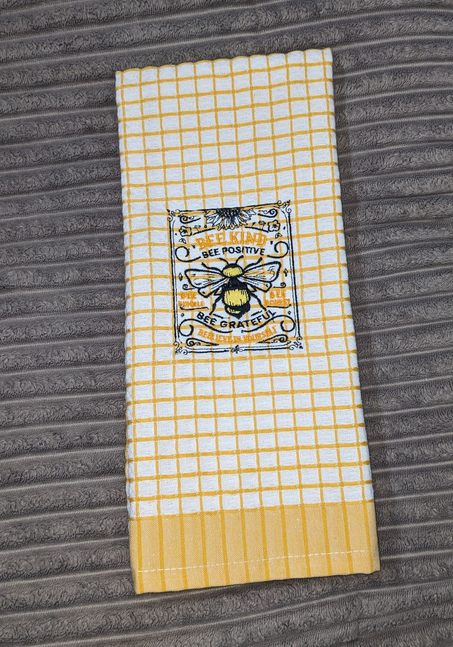 Decorative bee-themed kitchen towel