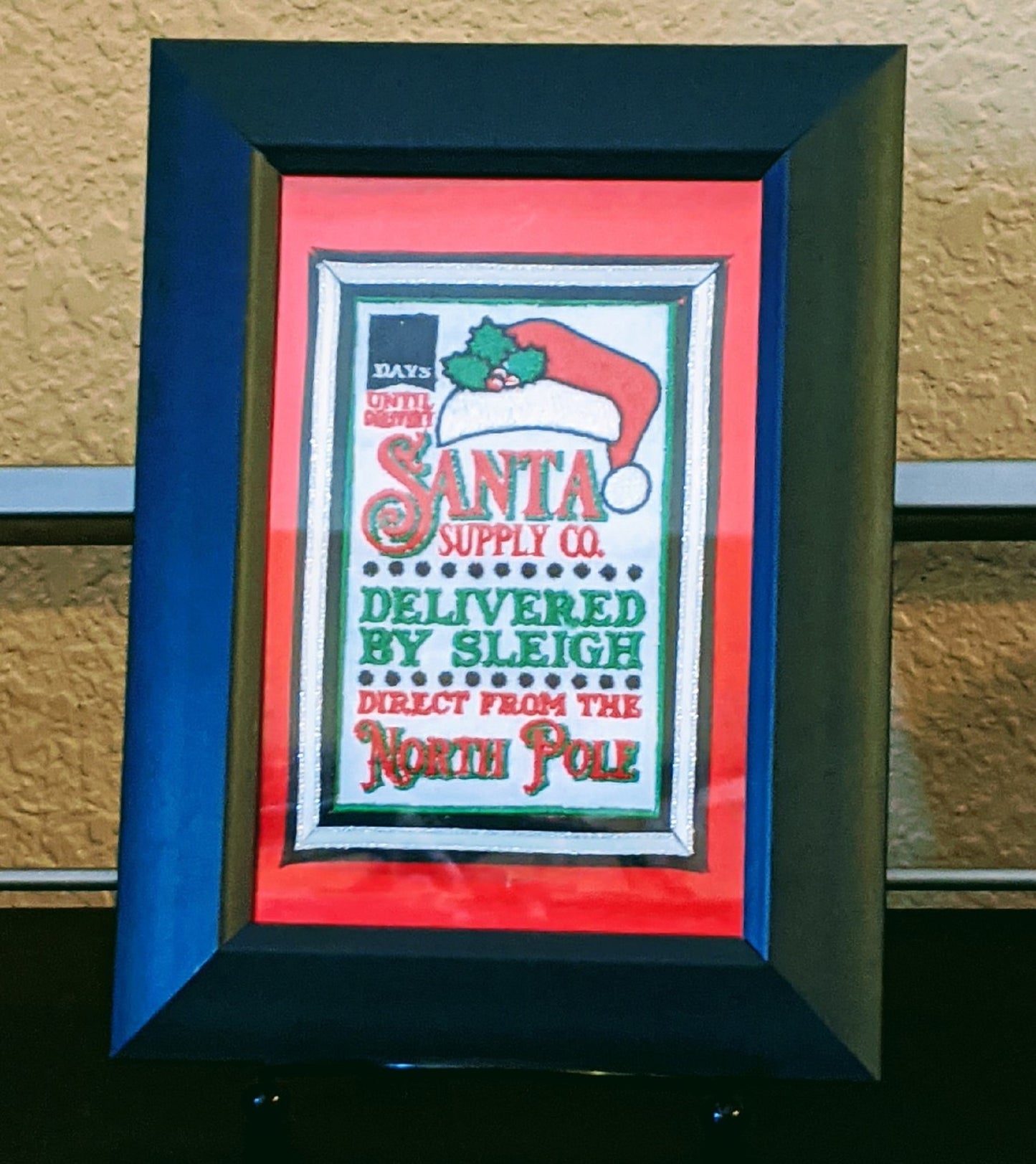 Santa Supply Company-Delivered By Sleigh-Machine Embroidered Framed Picture